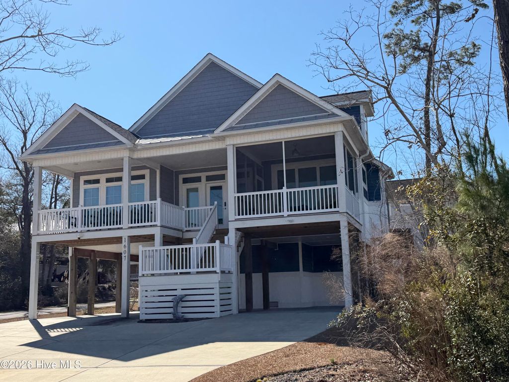 Photo of 1607 E Yacht Drive, Oak Island, NC 28465 (MLS # 100556192)