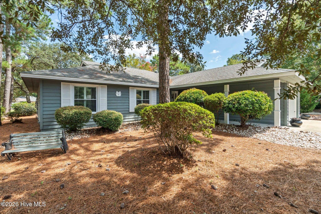 Photo of 610 Wisteria Drive, Sunset Beach, NC 28468 (MLS # 100603224)