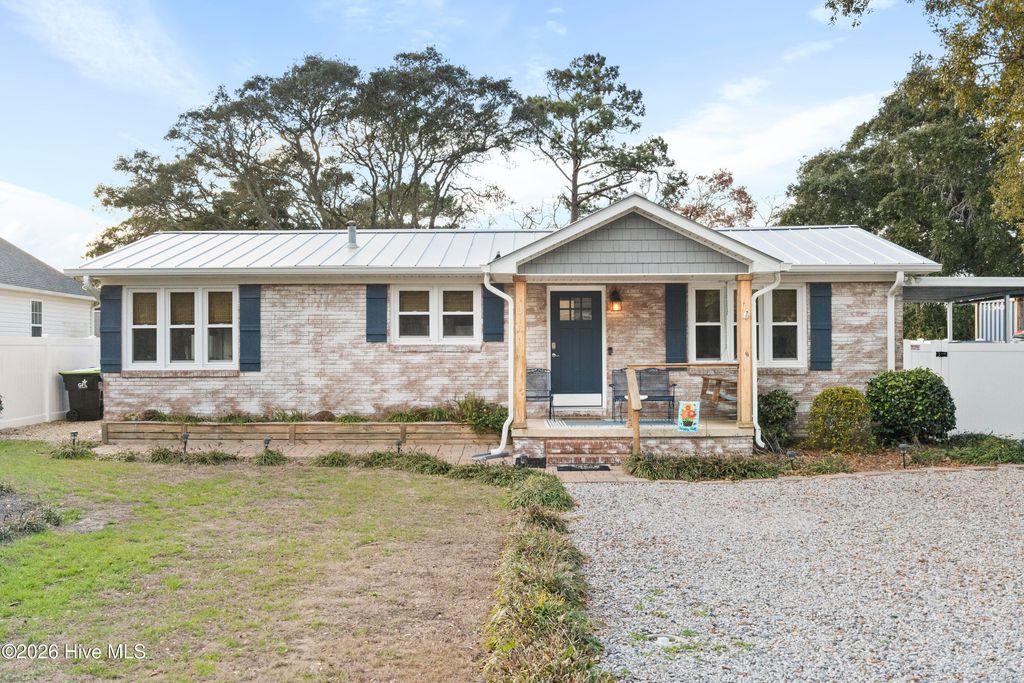 Photo of 313 Keziah Street, Oak Island, NC 28465 (MLS # 100555391)