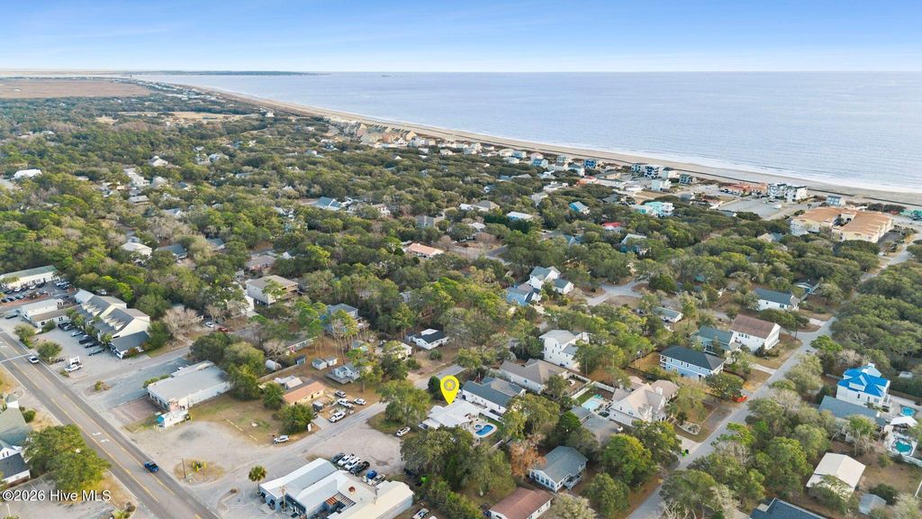 Photo of 313 Keziah Street, Oak Island, NC 28465 (MLS # 100555391)