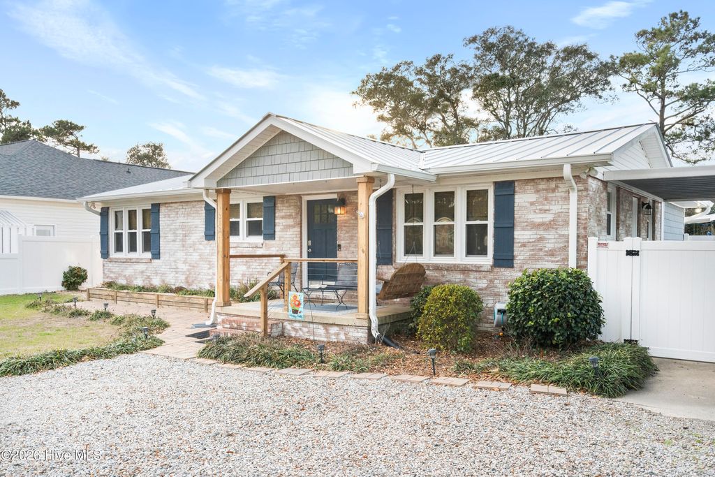 Photo of 313 Keziah Street, Oak Island, NC 28465 (MLS # 100555391)