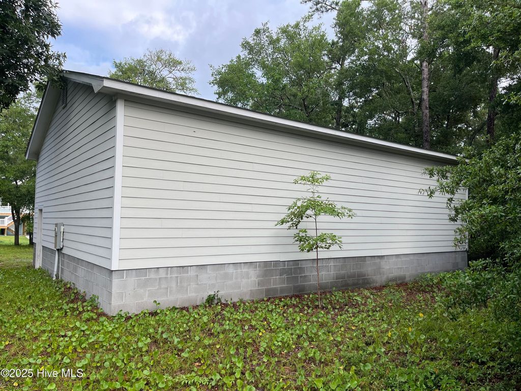 Photo of 132 NW 18th Street, Oak Island, NC 28465 (MLS # 100535707)