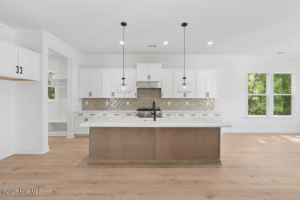 Photo of 6083 Ocean Isle Palms Way SW, Shallotte, NC 28470 (MLS # 100508363)