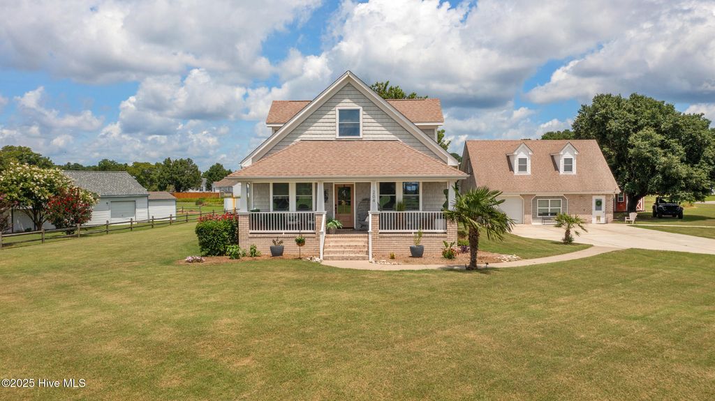 Photo of 204 Fentress Drive, Knotts Island, NC 27950 (MLS # 100546942)