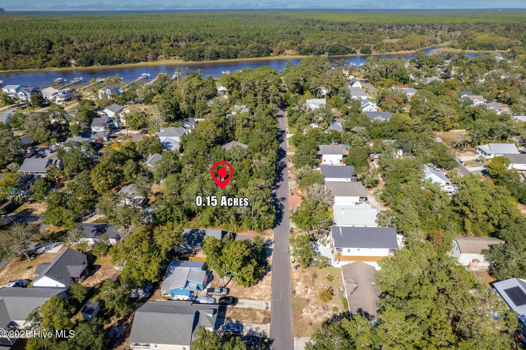 Photo of 129 NW 15th Street, Oak Island, NC 28465 (MLS # 100537208)