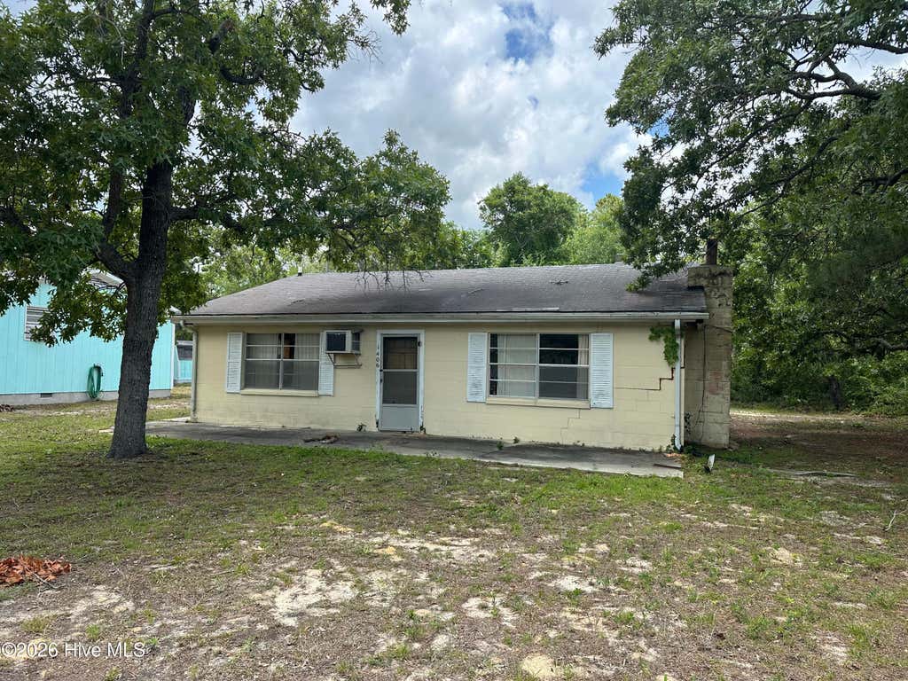 Photo of 1406 E Oak Island Drive, Oak Island, NC 28465 (MLS # 100586241)