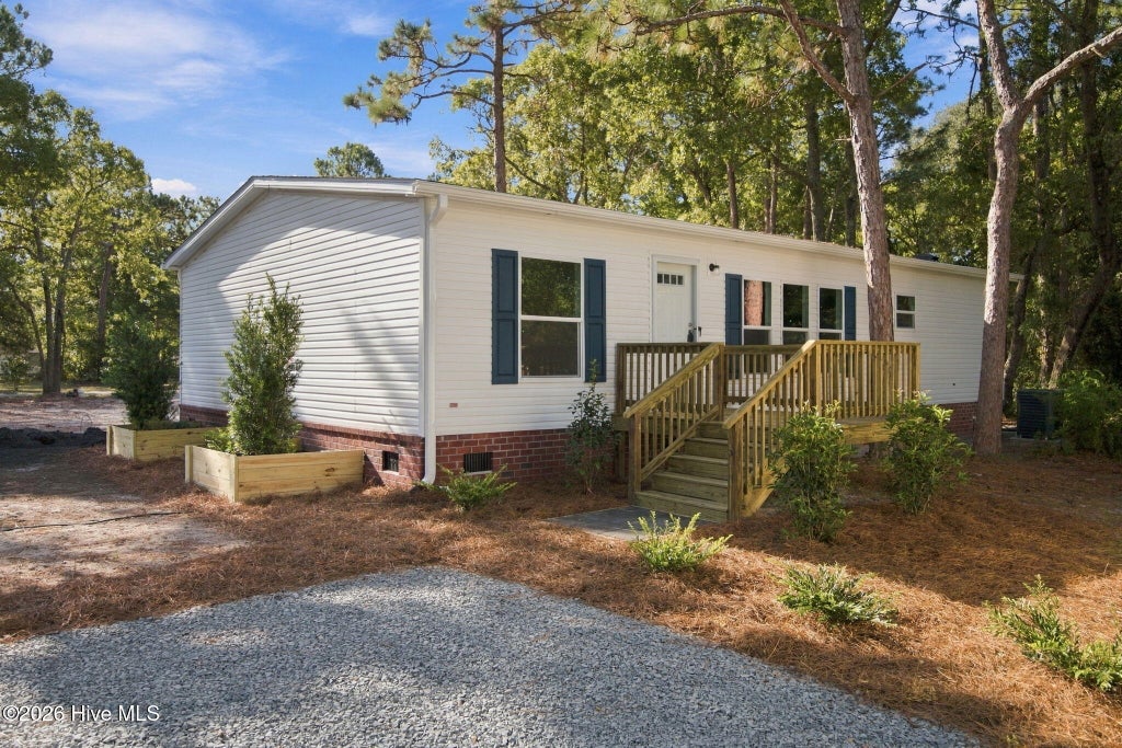 Photo of 209 Sycamore Road, Southport, NC 28461 (MLS # 100608430)