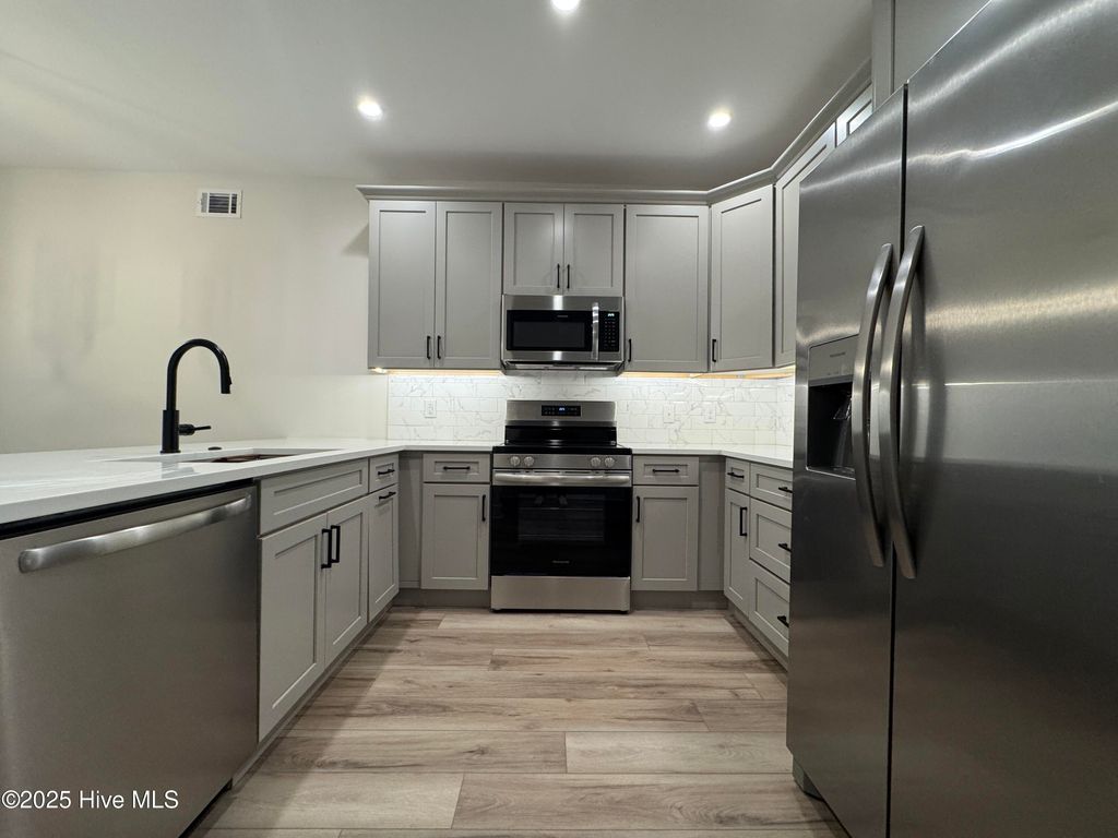 Photo of 717 Bragg Drive #Apt D, Wilmington, NC 28412 (MLS # 100543534)