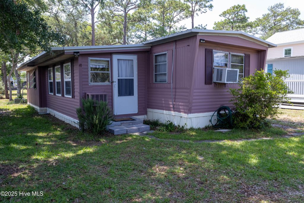 Photo of 131 NE 75th Street, Oak Island, NC 28465 (MLS # 100516366)