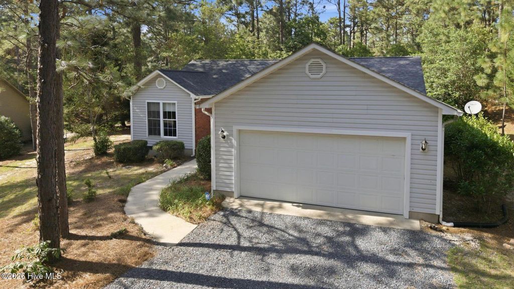 Photo of 244 Firetree Lane, Seven Lakes, NC 27376 (MLS # 100575387)
