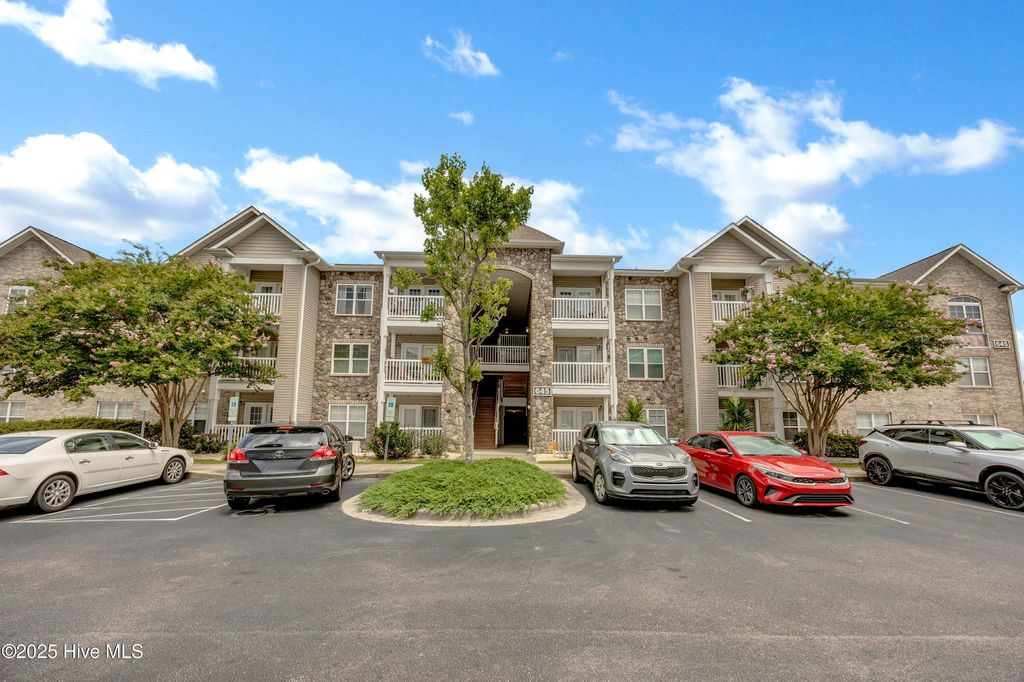 Photo of 645 Condo Club Drive #Unit 302, Wilmington, NC 28412 (MLS # 100521758)