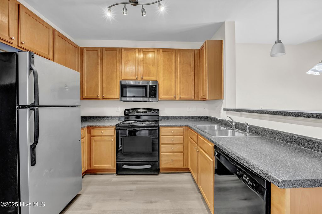 Photo of 645 Condo Club Drive #Unit 302, Wilmington, NC 28412 (MLS # 100521758)