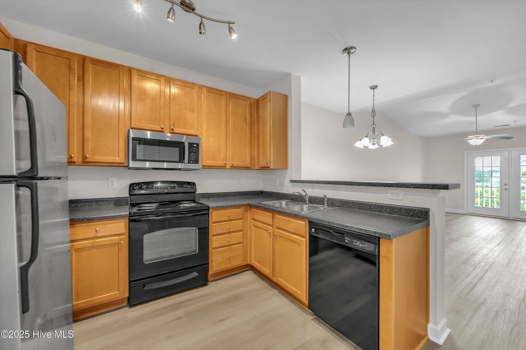 Photo of 645 Condo Club Drive #Unit 302, Wilmington, NC 28412 (MLS # 100521758)