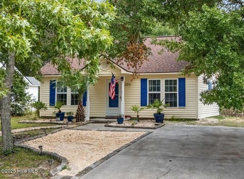 Photo of 1304 E Oak Island Drive, Oak Island, NC 28465 (MLS # 100557210)