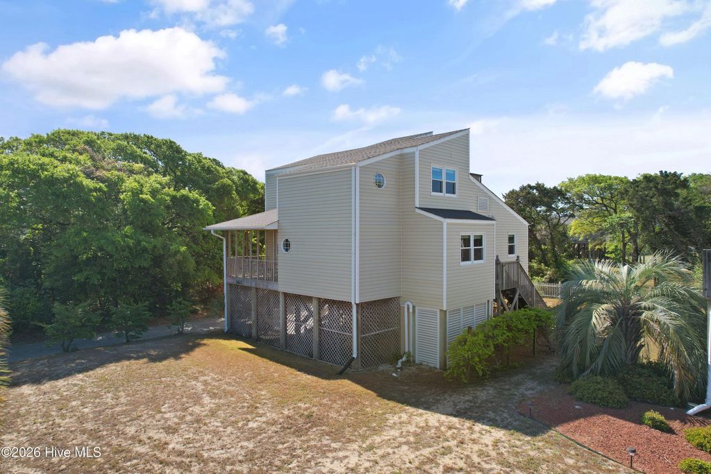 Photo of 1621 E Pelican Drive, Oak Island, NC 28465 (MLS # 100569880)