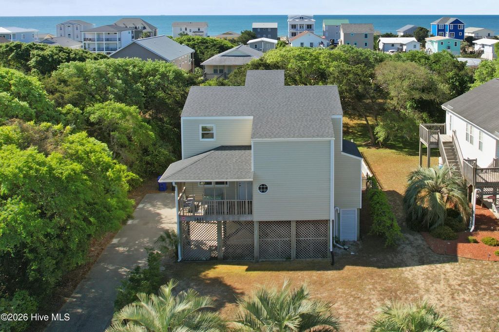 Photo of 1621 E Pelican Drive, Oak Island, NC 28465 (MLS # 100569880)