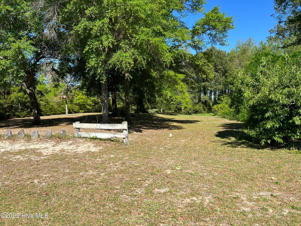 Photo of 7631 Scout Camp Hatila Road, Wilmington, NC 28409 (MLS # 100501855)