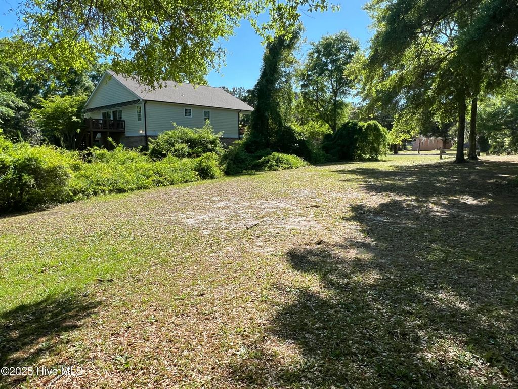 Photo of 7631 Scout Camp Hatila Road, Wilmington, NC 28409 (MLS # 100501855)