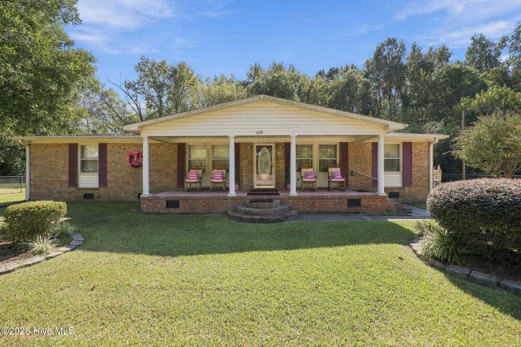 Photo of 409 E Railroad Street, Robersonville, NC 27871 (MLS # 100607754)