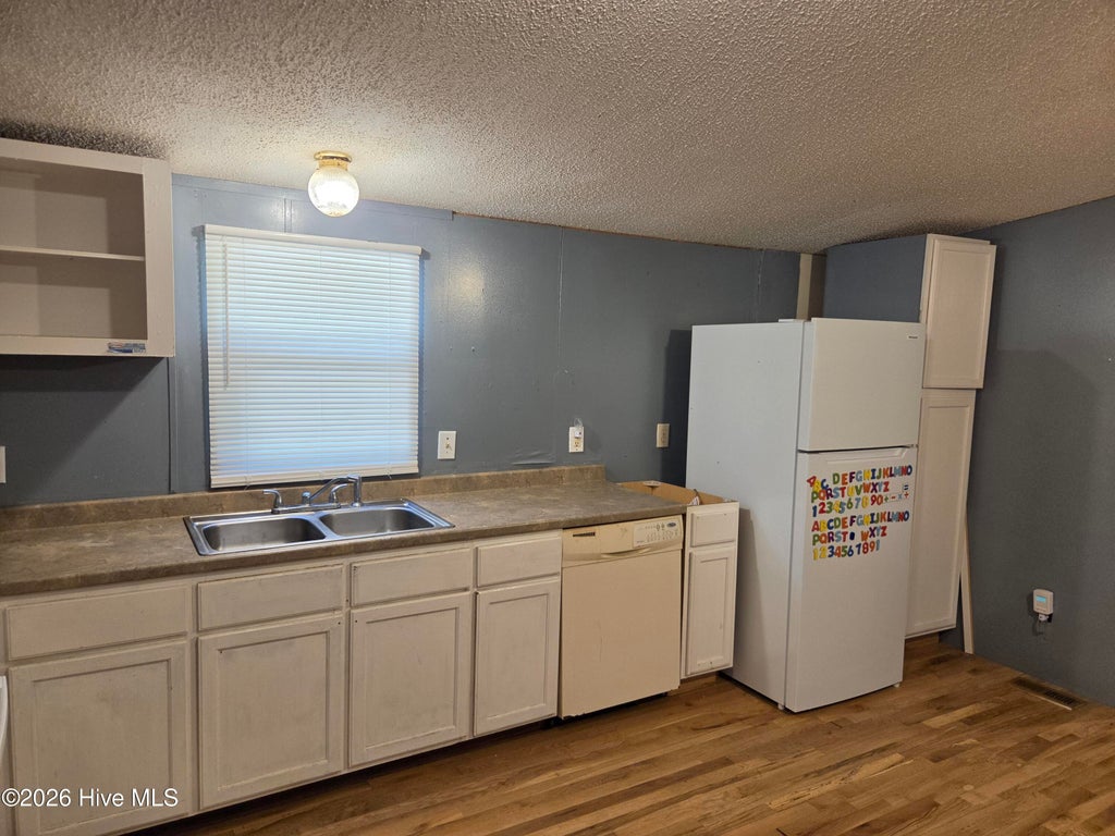 Photo of 653 Harris Creek Road, Jacksonville, NC 28540 (MLS # 100611323)