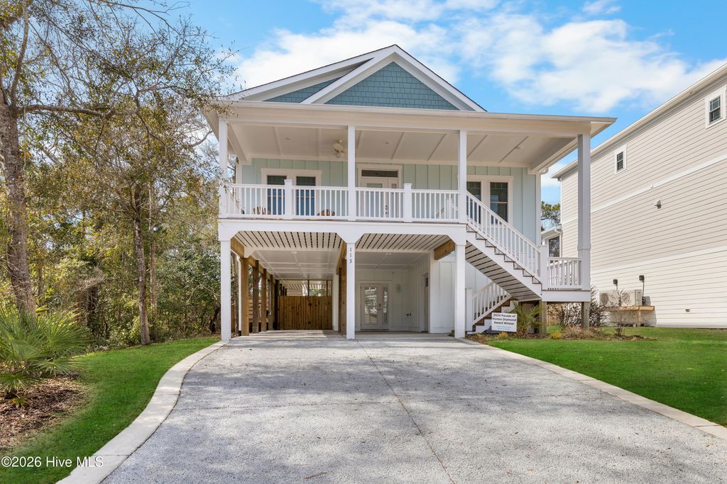 Photo of 113 SW 22nd Street, Oak Island, NC 28465 (MLS # 100555658)