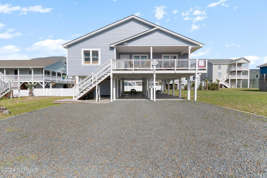 Photo of 130 Crab Street, Holden Beach, NC 28462 (MLS # 100558410)
