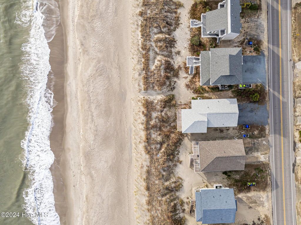 Photo of 707 W Beach Drive, Oak Island, NC 28465 (MLS # 100570347)