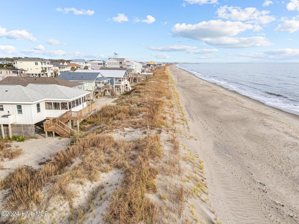 Photo of 707 W Beach Drive, Oak Island, NC 28465 (MLS # 100570347)