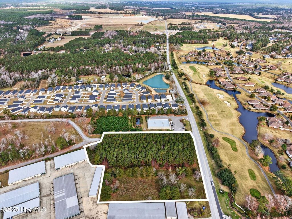 Photo of 310 Seaside Road SW, Sunset Beach, NC 28468 (MLS # 100543423)