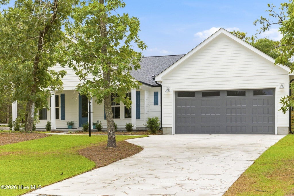Photo of 825 Sand Fiddler Court SE, Bolivia, NC 28422 (MLS # 100584205)