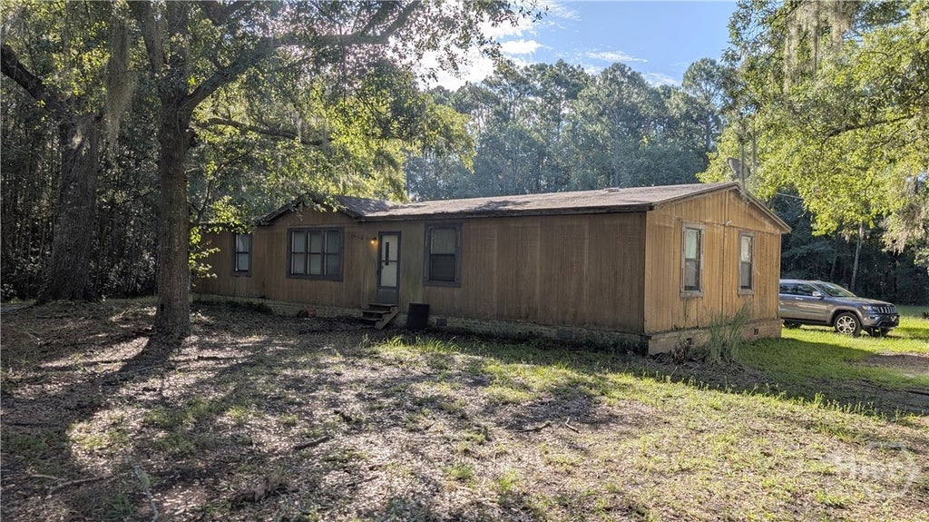 Photo of 5760 Rye Patch Road NE, Ludowici, GA 31316 (MLS # SA367207)
