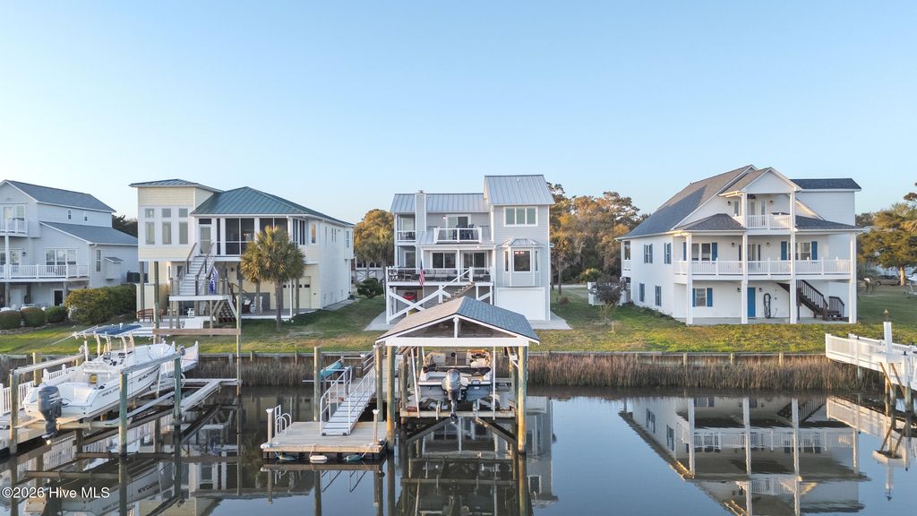 Photo of 103 E Island Drive, Oak Island, NC 28465 (MLS # 100564811)