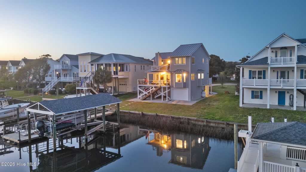 Photo of 103 E Island Drive, Oak Island, NC 28465 (MLS # 100564811)