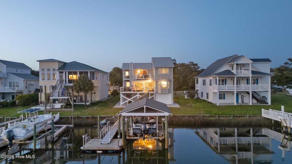 Photo of 103 E Island Drive, Oak Island, NC 28465 (MLS # 100564811)