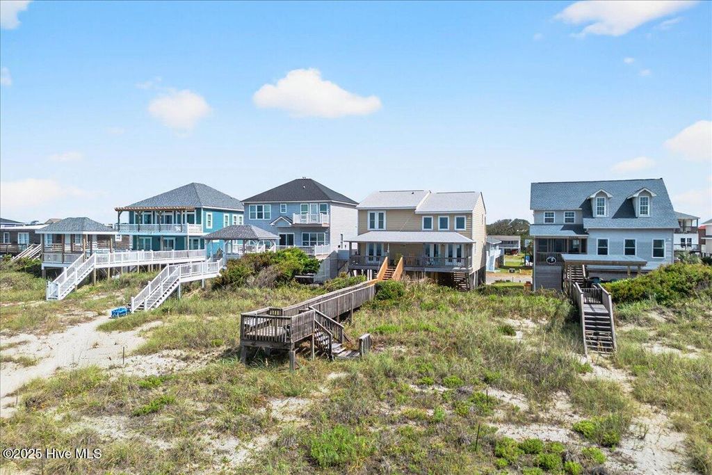 Photo of 2221 E Beach Drive, Oak Island, NC 28465 (MLS # 100521504)