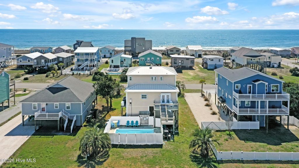 Photo of 1018 W Dolphin Drive, Oak Island, NC 28465 (MLS # 100559686)