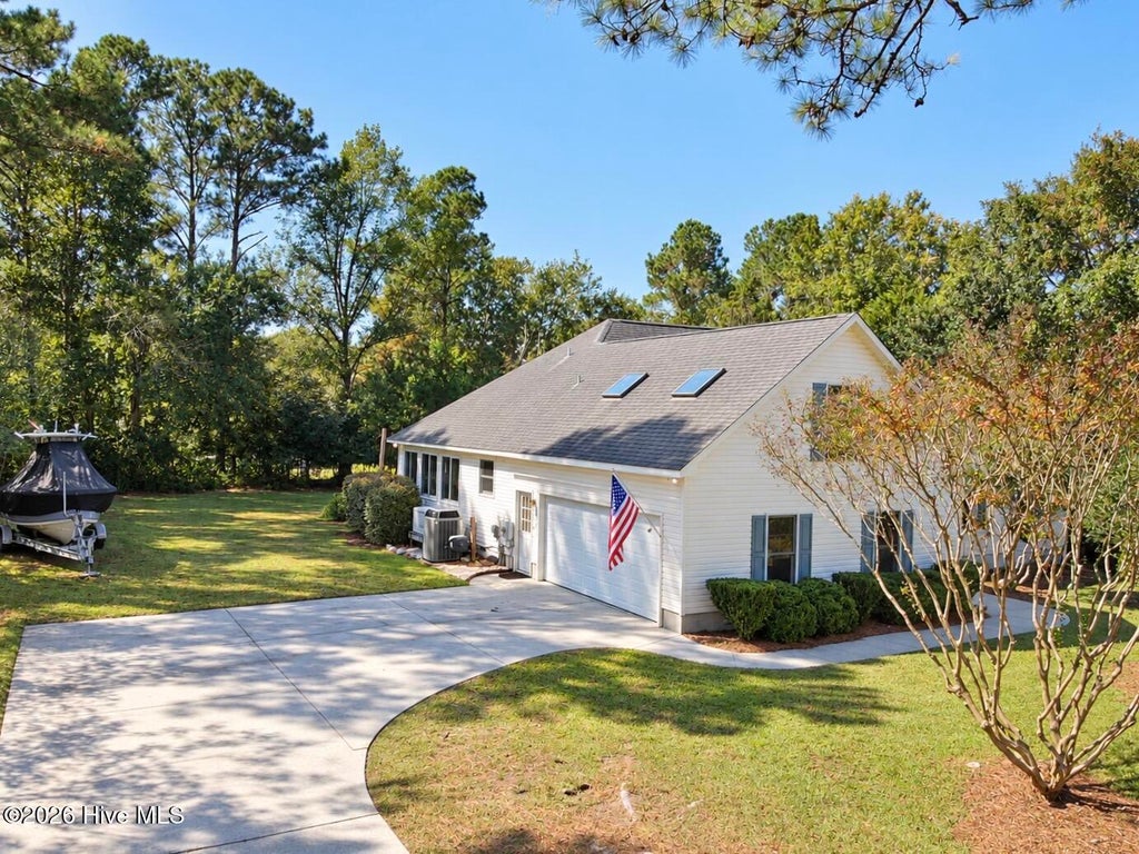Photo of 305 Shearwater Drive, Hampstead, NC 28443 (MLS # 100610891)