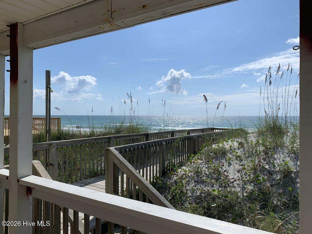 Photo of 1115 Ocean Boulevard, Holly Ridge, NC 28445 (MLS # 100594762)