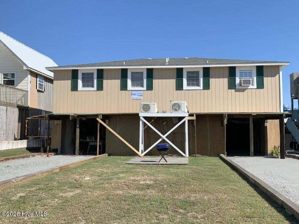 Photo of 1115 Ocean Boulevard, Holly Ridge, NC 28445 (MLS # 100594762)