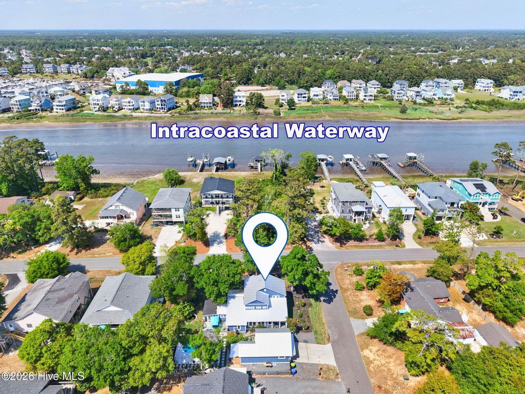 Photo of 3505 E Yacht Drive, Oak Island, NC 28465 (MLS # 100571912)