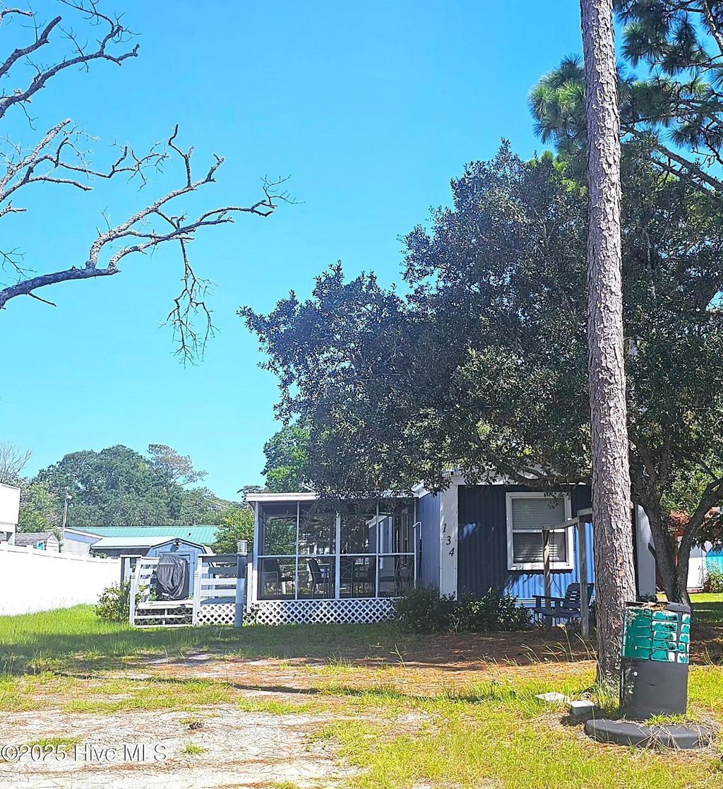Photo of 134 NE 71st Street, Oak Island, NC 28465 (MLS # 100531446)