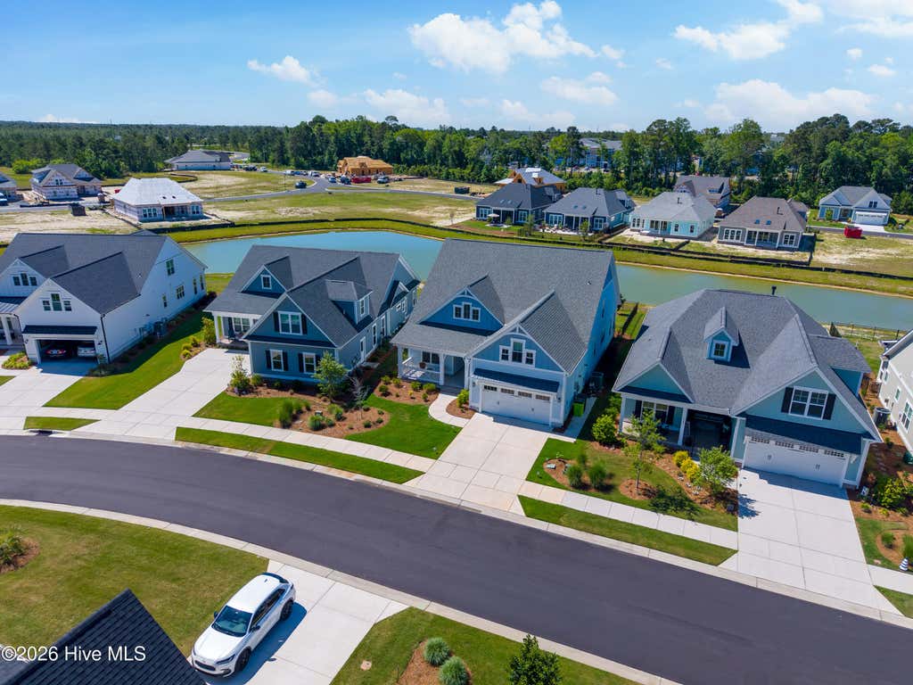 Photo of 3389 Island Lakes Drive, Southport, NC 28461 (MLS # 100593143)