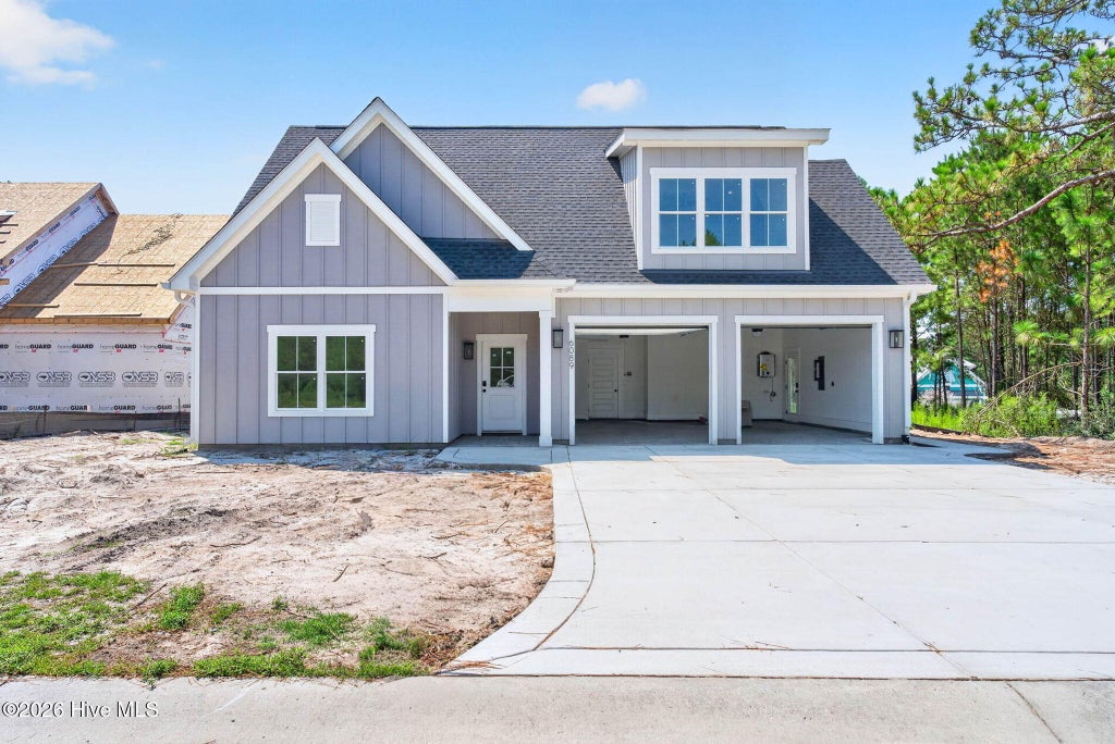 Photo of 6089 Martinque Street SW, Shallotte, NC 28470 (MLS # 100600385)