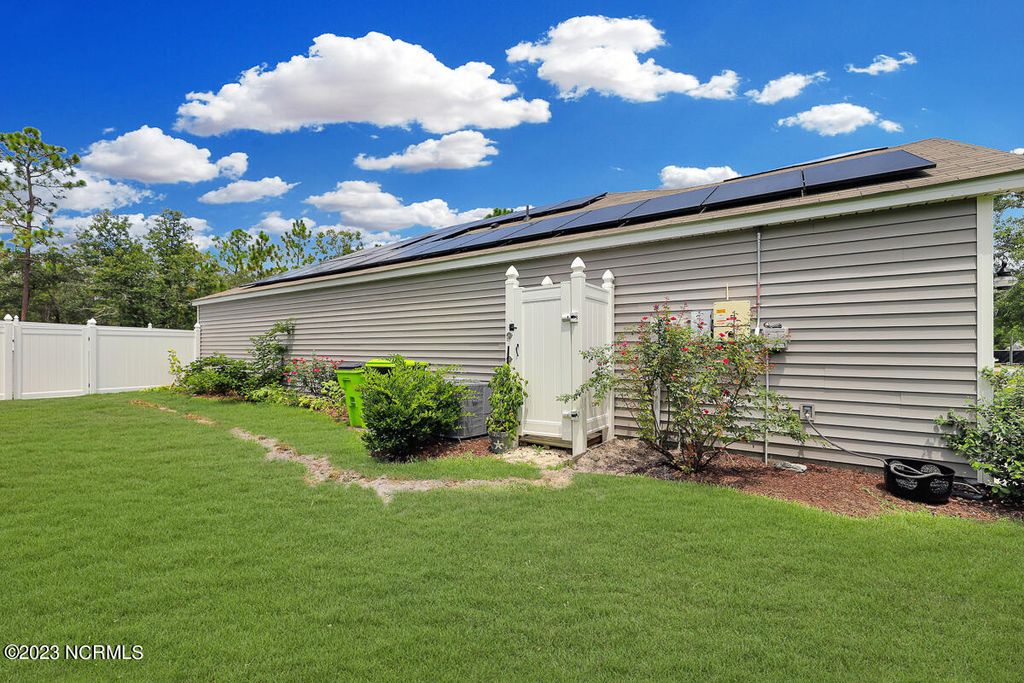 Photo of 405 Red Fox Street NW, Shallotte, NC 28470 (MLS # 100522221)