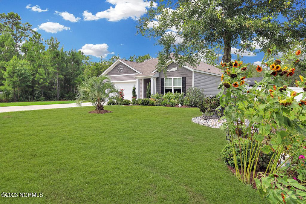 Photo of 405 Red Fox Street NW, Shallotte, NC 28470 (MLS # 100522221)