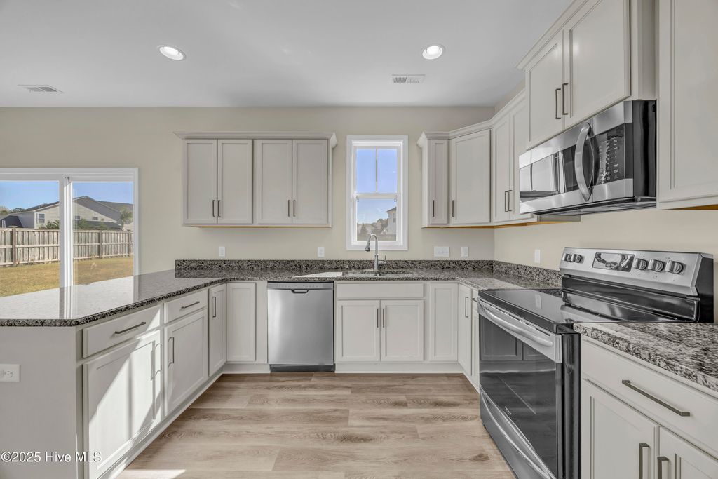 Photo of 734 Pine Cone Drive, Leland, NC 28479 (MLS # 100542048)