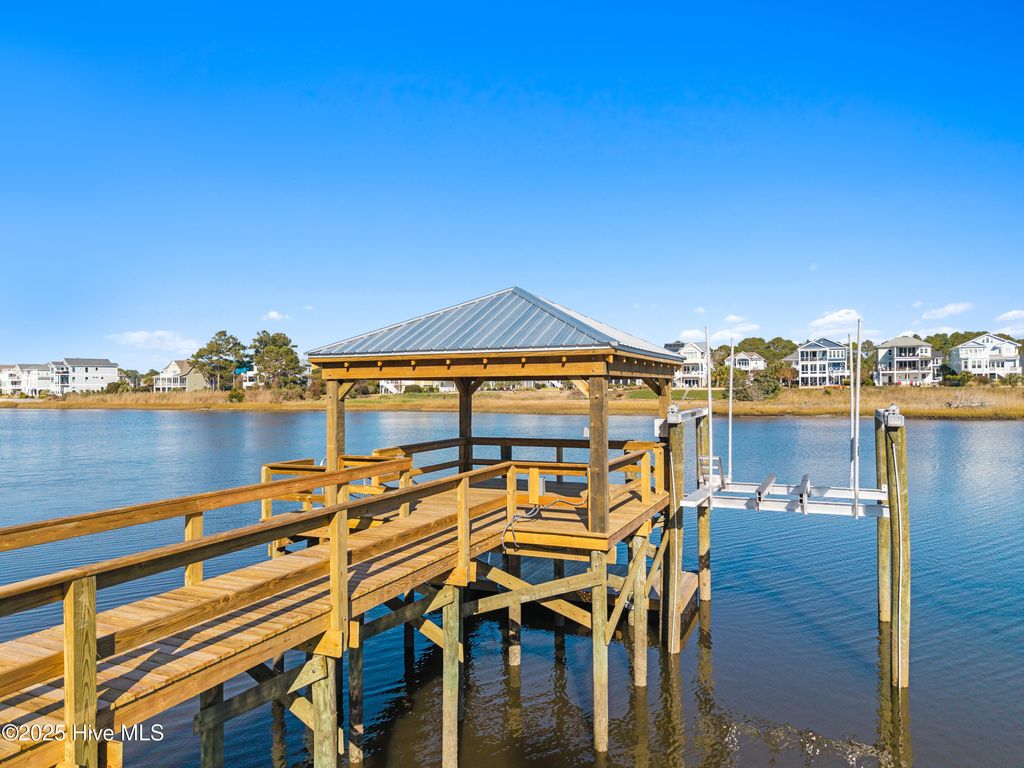 Photo of 3704 E Yacht Drive, Oak Island, NC 28465 (MLS # 100545556)