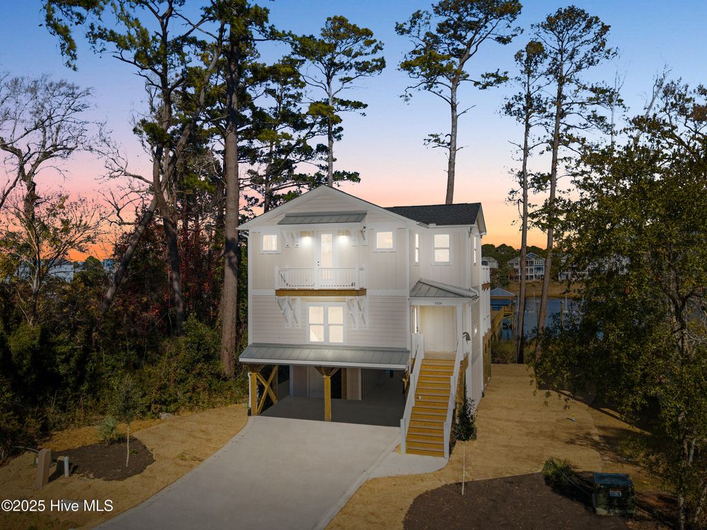 Photo of 3704 E Yacht Drive, Oak Island, NC 28465 (MLS # 100545556)