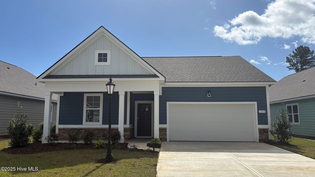 Photo of 1210 Woodhouse Drive NW, Ash, NC 28420 (MLS # 100504634)