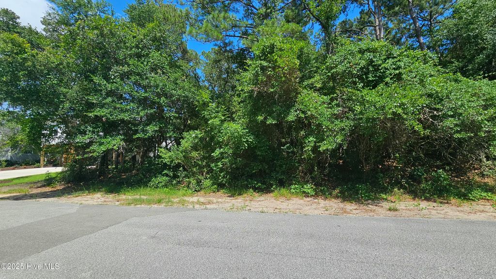 Photo of 108 SW 22nd Street, Oak Island, NC 28465 (MLS # 100547484)